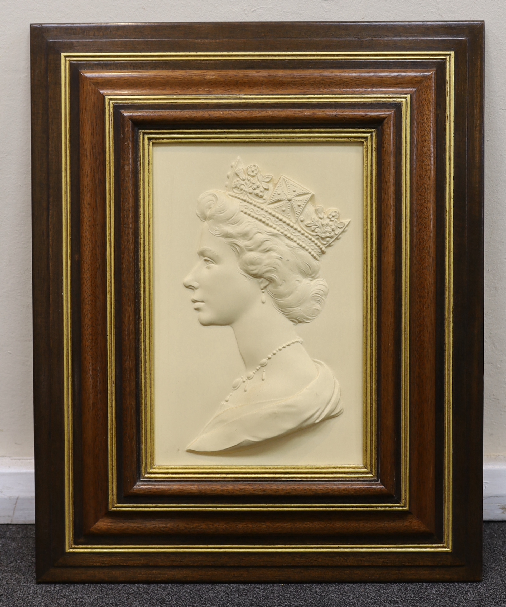 Arnold Machin OBE R.A., A Royal Worcester porcelain plaque, Portrait of Her Majesty Queen Elizabeth II, number 230/1000, 33 x 21.5cm, in original hardwood frame